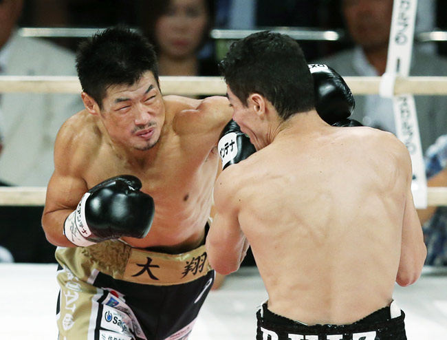 WBCスーパーバンタム級世界戦の1回…：プロボクシング 長谷川穂積