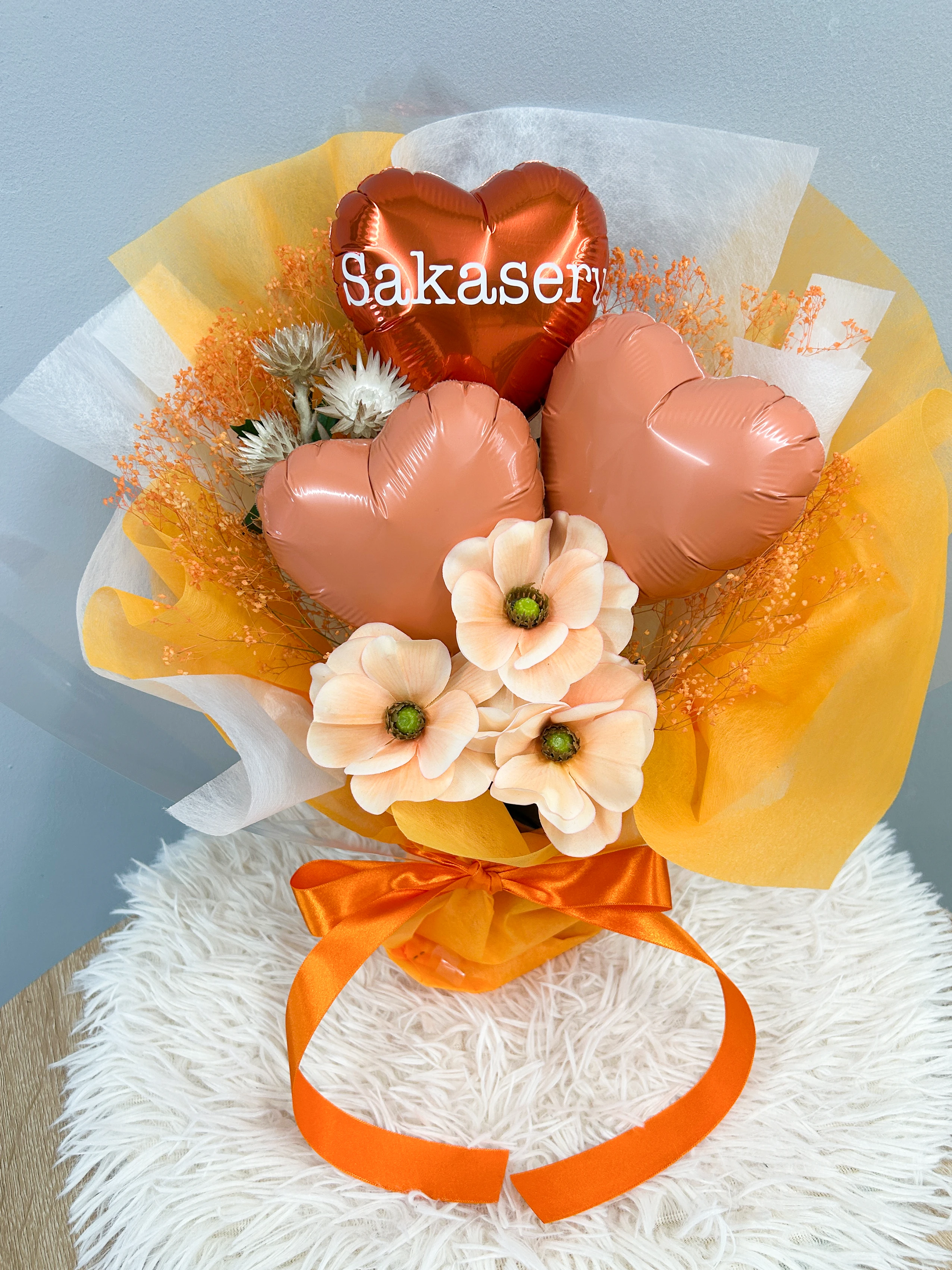 文字入れできるパステルバルーンアレンジ オレンジ｜フラスタ・楽屋花